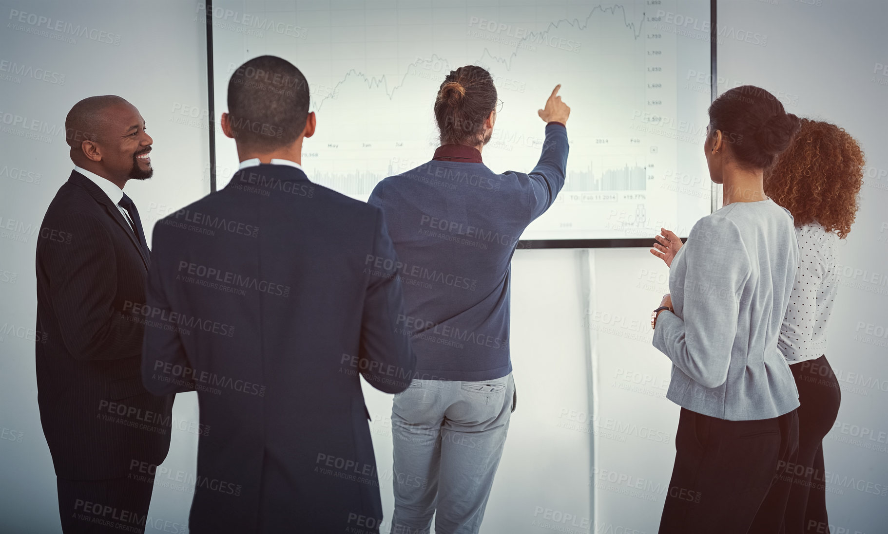 Buy stock photo Shot of a young businessman giving a presentation in the boardroom