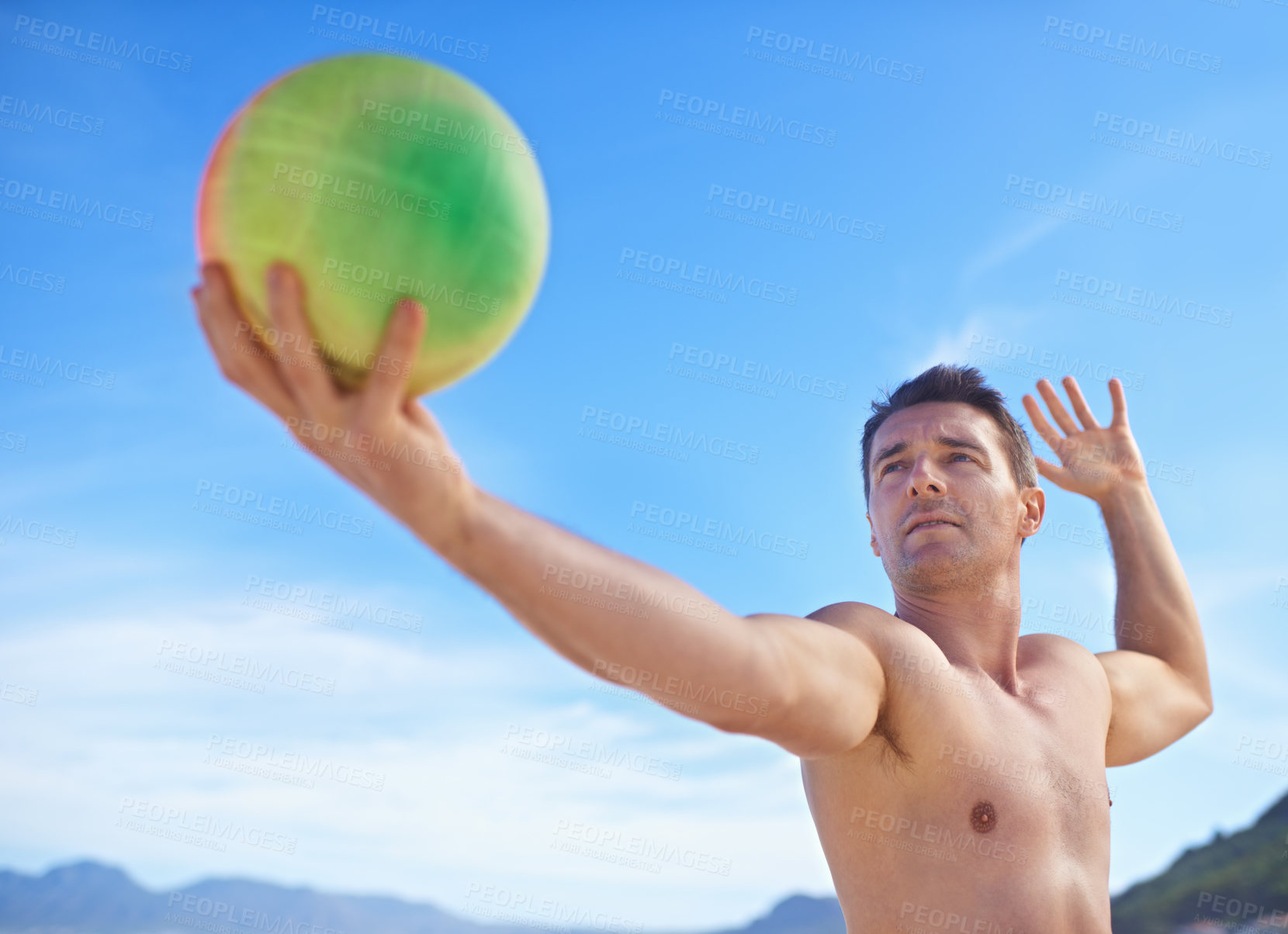 Buy stock photo Beach, volleyball and man with fitness, vacation and sunshine with player and workout for wellness. Person, athlete and guy with fun and seaside with training and practice for health and adventure