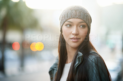 Buy stock photo Shot of an attractive young woman out in the city