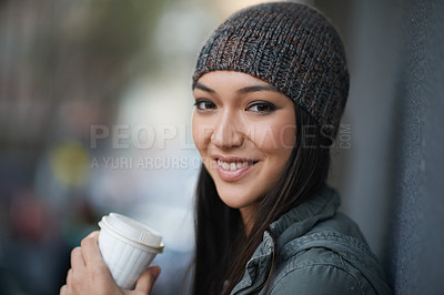 Buy stock photo Portrait, city and smile with woman, coffee and relaxing with winter season and wool cap. Face, person and girl with tea and cappuccino with urban town and knitted beanie with happiness in a street