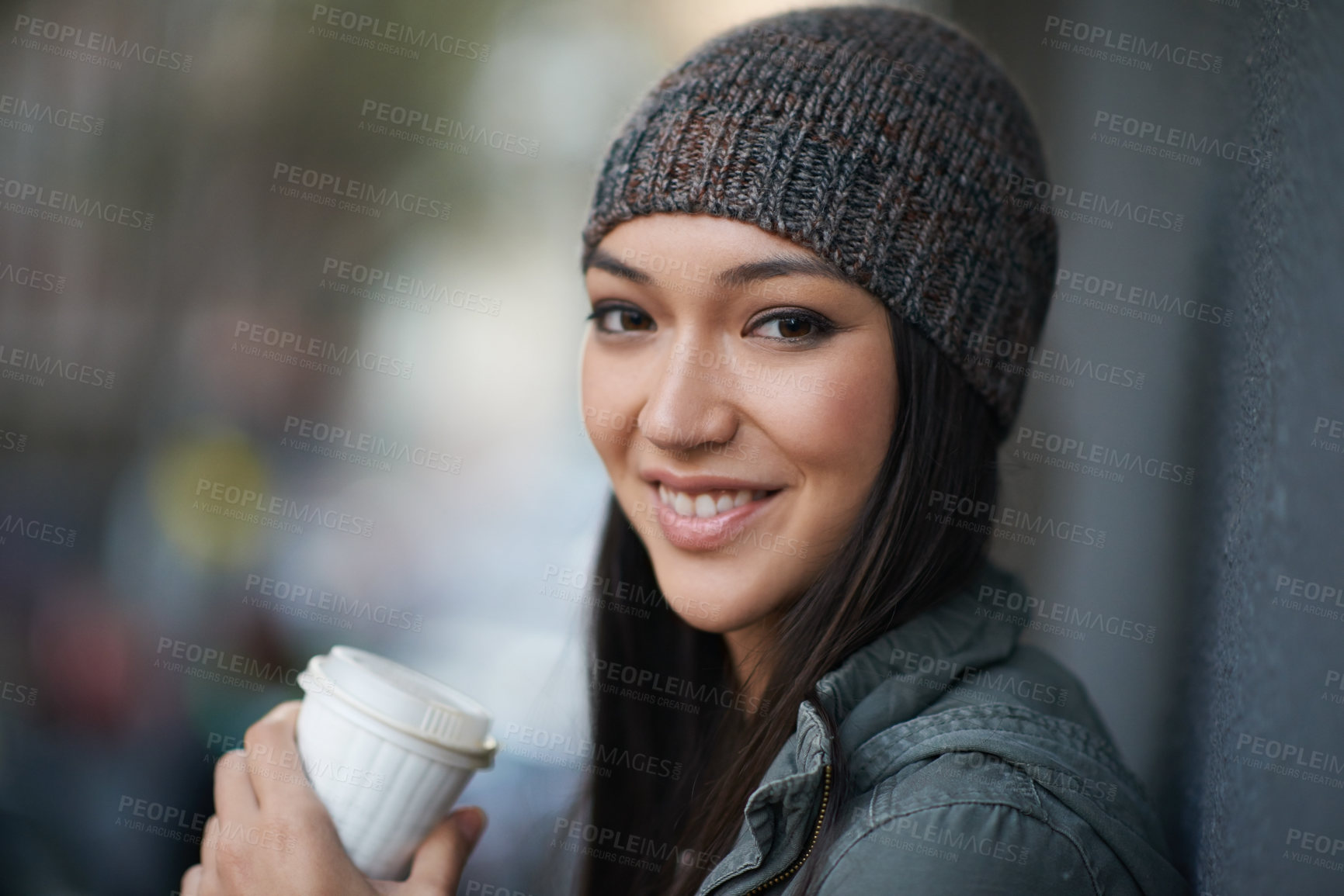 Buy stock photo Portrait, city and smile with woman, coffee and relaxing with winter season and wool cap. Face, person and girl with tea and cappuccino with urban town and knitted beanie with happiness in a street