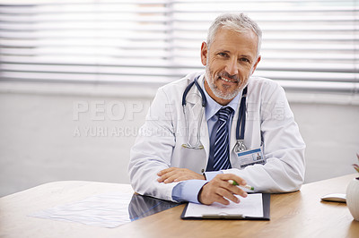 Buy stock photo Happy, portrait and doctor with a clipboard in his office analyzing test results in a hospital. Confidence, smile and professional mature male healthcare worker sitting by his desk in medical clinic.
