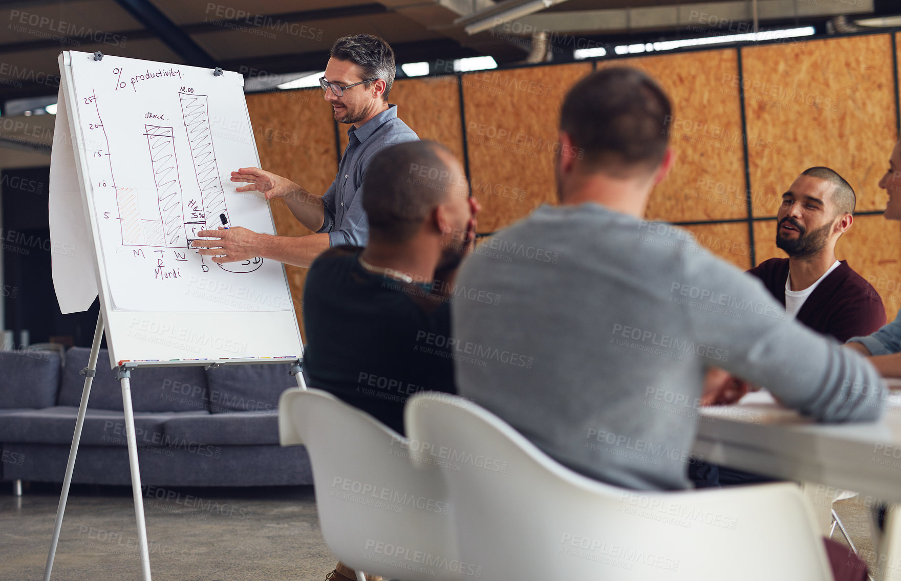 Buy stock photo Seminar, whiteboard and man in office for feedback, productivity and positive reinforcement. Small business, leader and happy people in boardroom for presentation with graph for performance review