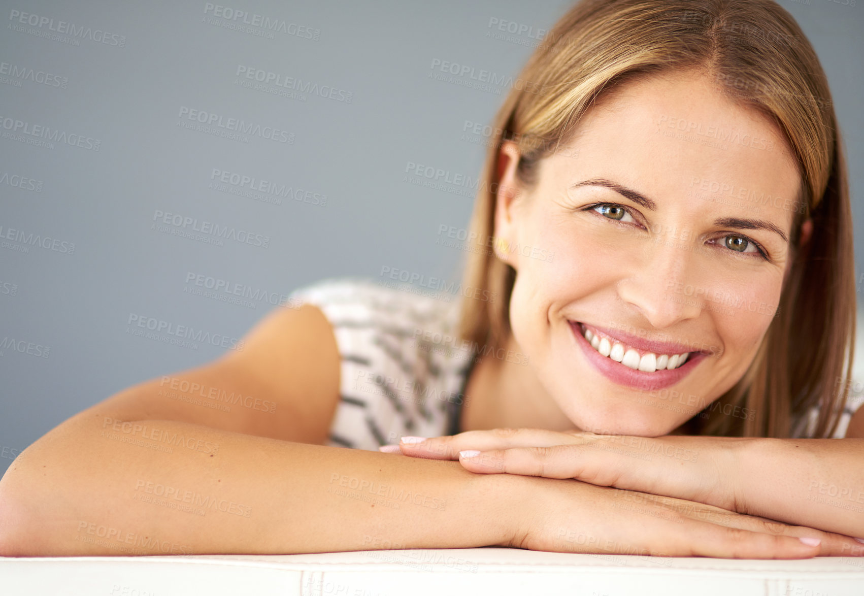 Buy stock photo Relax, mockup or portrait of happy woman on sofa in living room to enjoy peace or break in home. Confident, satisfaction or female person in house lounge alone for resting, smile and lying on day off