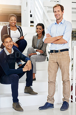 Buy stock photo Portrait of a group of coworkers in a stairwell in a modern office