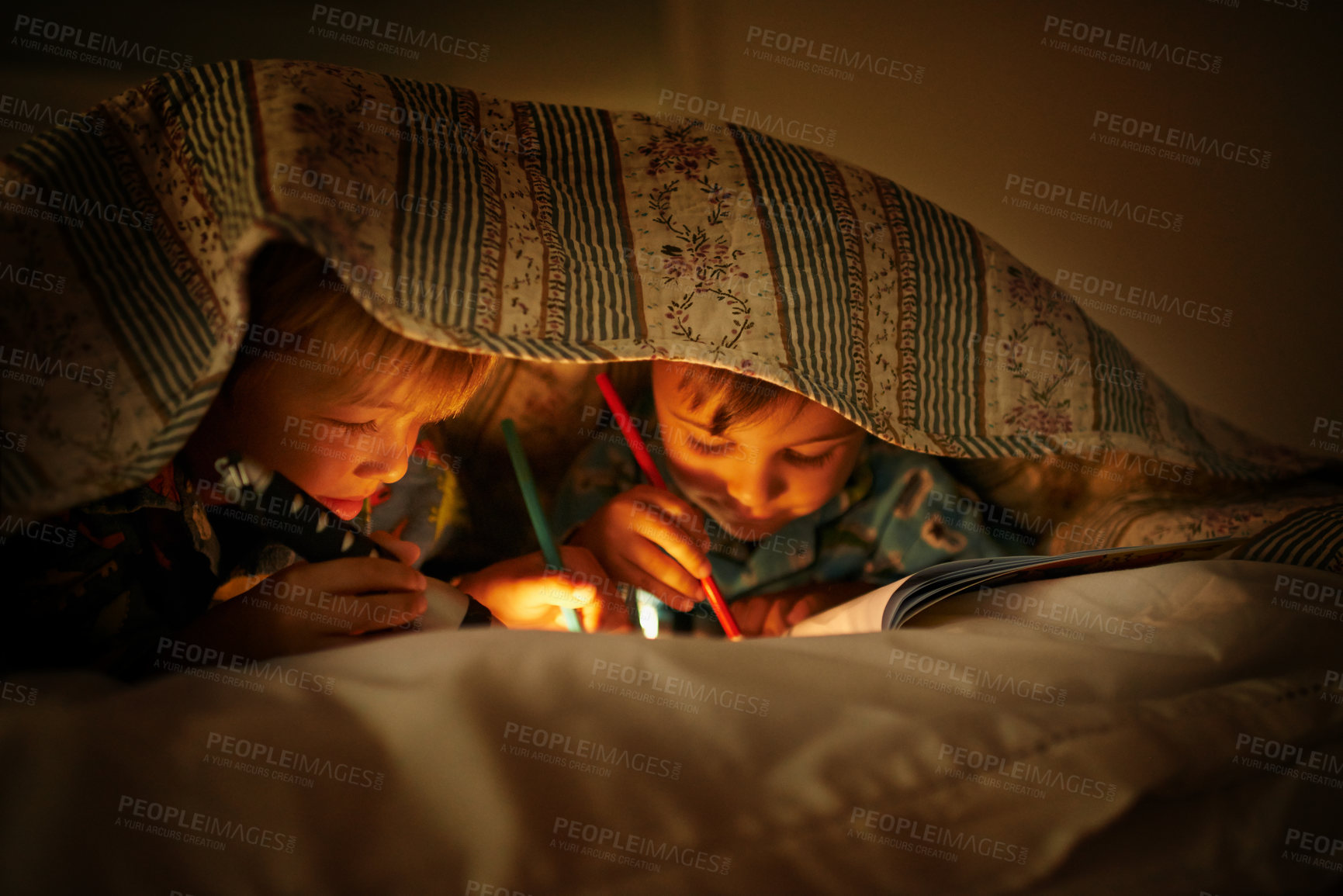 Buy stock photo Blanket, flashlight and children at night with happiness and drawing in a book with a torch. Friends, relax and sketch on notebook in dark with light under duvet at sleepover with a pillow tent