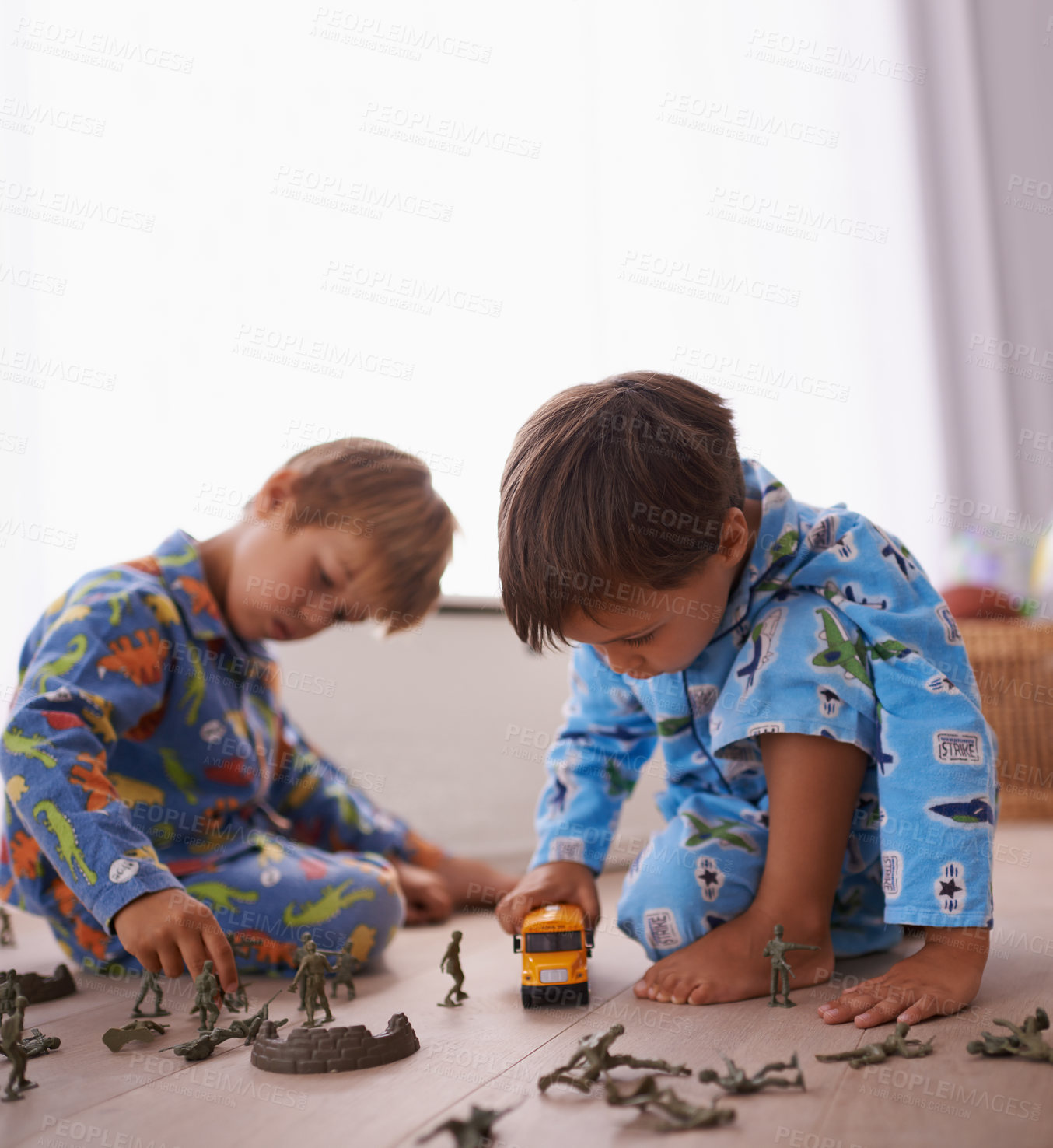 Buy stock photo Young boys, playing and toys together in pajamas for fun with miniature action figures, toy car or games. Brothers, sibling children and family bonding in playroom at home for learning or development