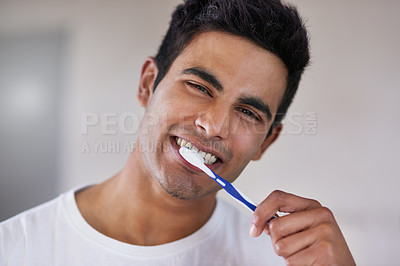 Buy stock photo Happy, portrait and man with toothbrush in bathroom for dental hygiene, gum disease and oral care. Health, mouth and face of person brushing teeth for wellness, cleaning and fresh breath in home