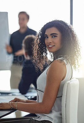 Buy stock photo Portrait of a pretty businesswoman smiling during a presentation in the boardroom