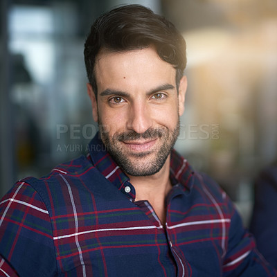 Buy stock photo Portrait of a smiling young businessman standing in an office