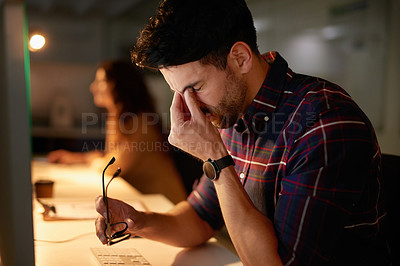Buy stock photo Stress, headache and burnout with a man programmer working on a computer in his office for design. Tired, 404 and deadline with a male employee working on system code for software development