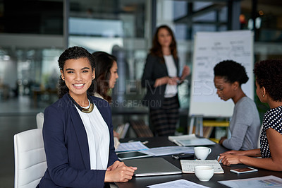 Buy stock photo Portrait of an attractive young businesswoman sitting in the boardroom during a meeting