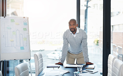 Buy stock photo Portrait of a handsome mature man standing at the head of the boardroom table
