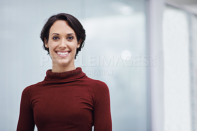 Buy stock photo Portrait of a confident young businesswoman in her office