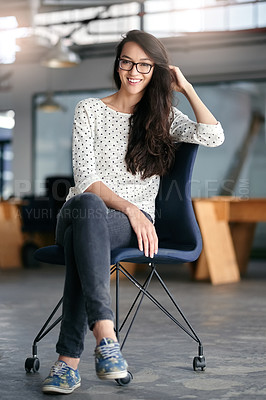 Buy stock photo Portrait, smile and glasses for woman, chair and creative in office with desk, startup and confidence. New York, workplace and female employee in agency, proud and vision for business and career