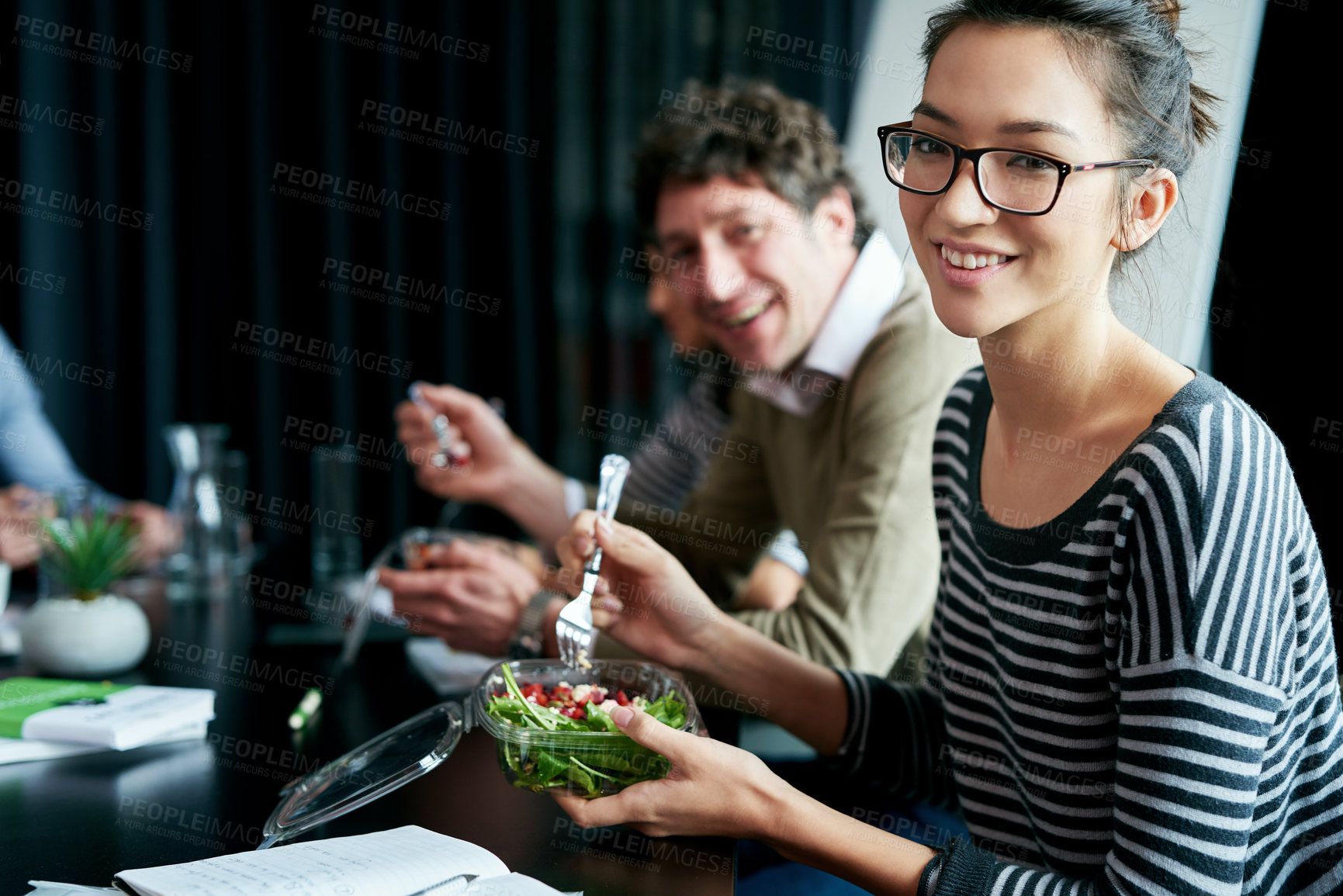Buy stock photo Meeting, happy and portrait of woman with salad in office for team building lunch for collaboration. Discussion, smile and food with female designer with colleagues eating healthy meal in workplace.