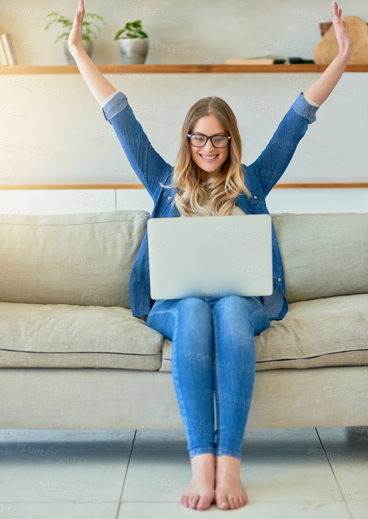 Buy stock photo Woman, laptop and celebrate with happiness on sofa for career milestone, winning and promotion achievement for work. Girl, home and cheer with success for online news, competition and prize giveaway.