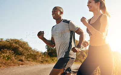 Buy stock photo Smile, running and health with couple in road for workout, cardio performance and summer. Marathon, exercise and teamwork with black man and woman runner in nature for sports, training and race