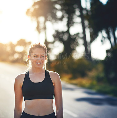 Buy stock photo Road, sunset and woman with thinking for fitness, exercise and ready for marathon challenge with pride. Outdoor, female person and runner with confidence for training, wellness and healthy with smile