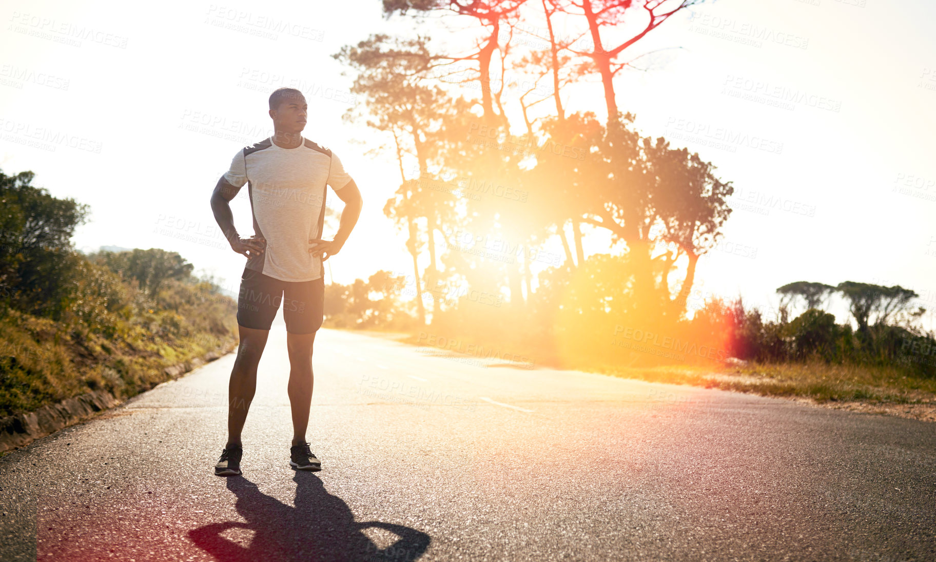 Buy stock photo Road, sunshine and black man with thinking for fitness, exercise and ready for marathon challenge. Outdoor, male person and runner with confidence for training, wellness and healthy living by sunset