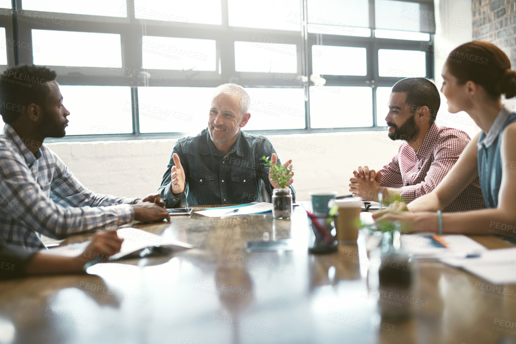 Buy stock photo Startup success, leader and employees in a meeting, planning and communication for corporate training. Management, happy staff and group with teamwork, coaching and brainstorming with business people