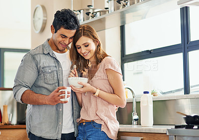 Buy stock photo Couple, hug and love in house with breakfast for relationship, date and time together in living room. Man, woman and support with happiness, tea and smile in home for connection, care and commitment