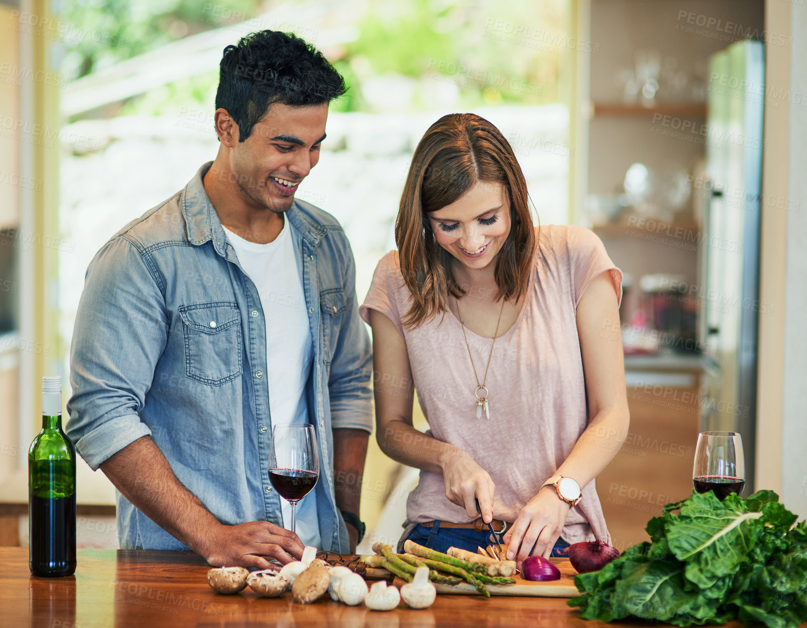 Buy stock photo Man, woman and ingredients for cooking, together and chopping with relationship and love in kitchen. Couple, home and food for dinner, supper and romance with recipe for date and relaxation in house