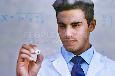 Buy stock photo Shot of a scientist writing formulas on a glass wall