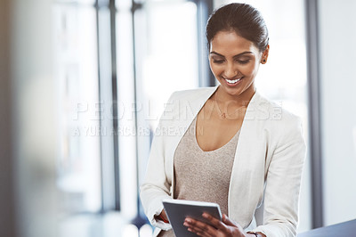 Buy stock photo Tablet, accountant and happy woman in office for business, research or online browsing. Smile, digital technology and corporate Indian auditor reading email, internet app or website info in company.
