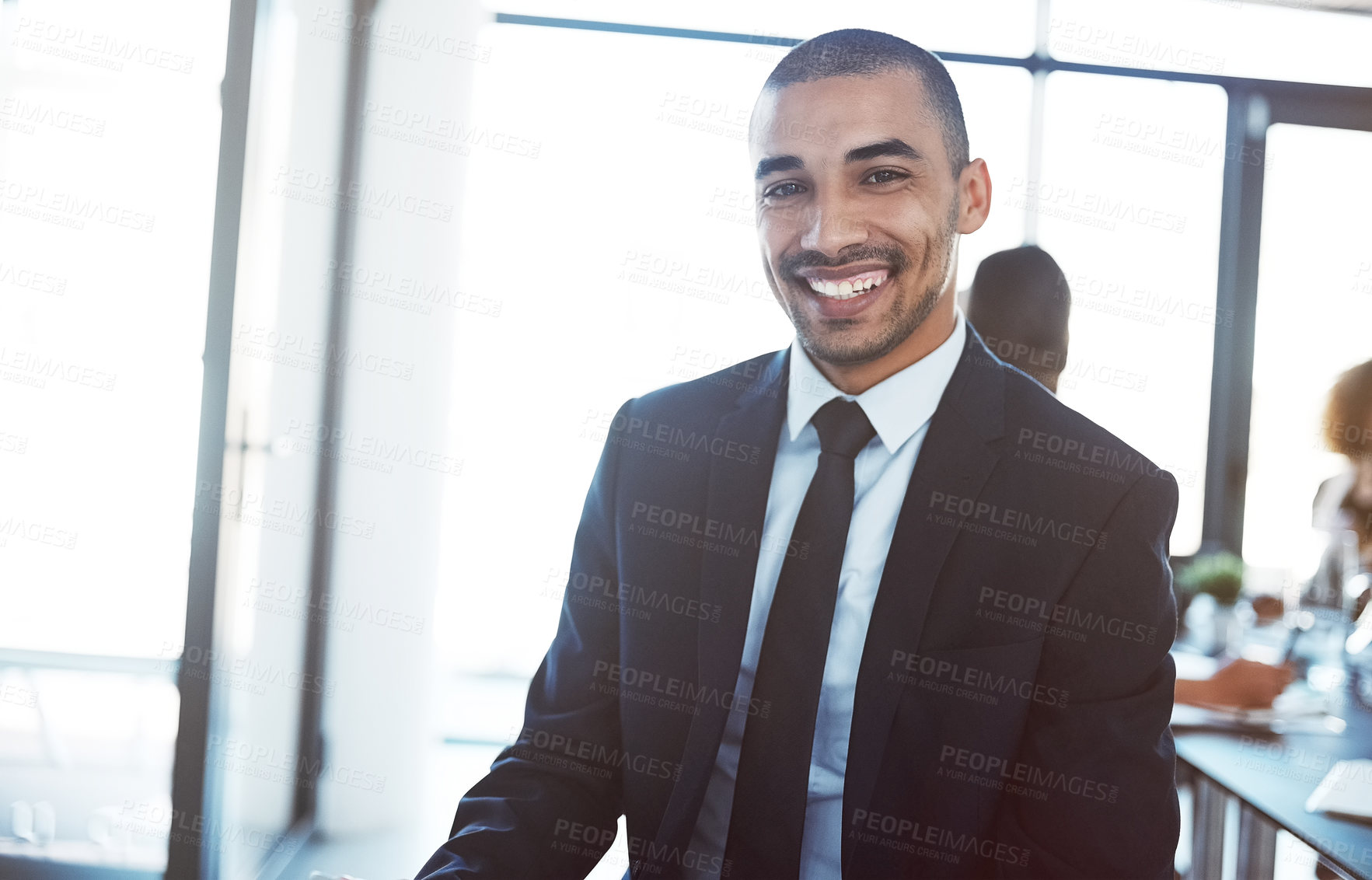 Buy stock photo Portrait of a confident young businessman in a meeting at work