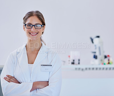 Buy stock photo Portrait of a smiling scientist standing in a laboratory