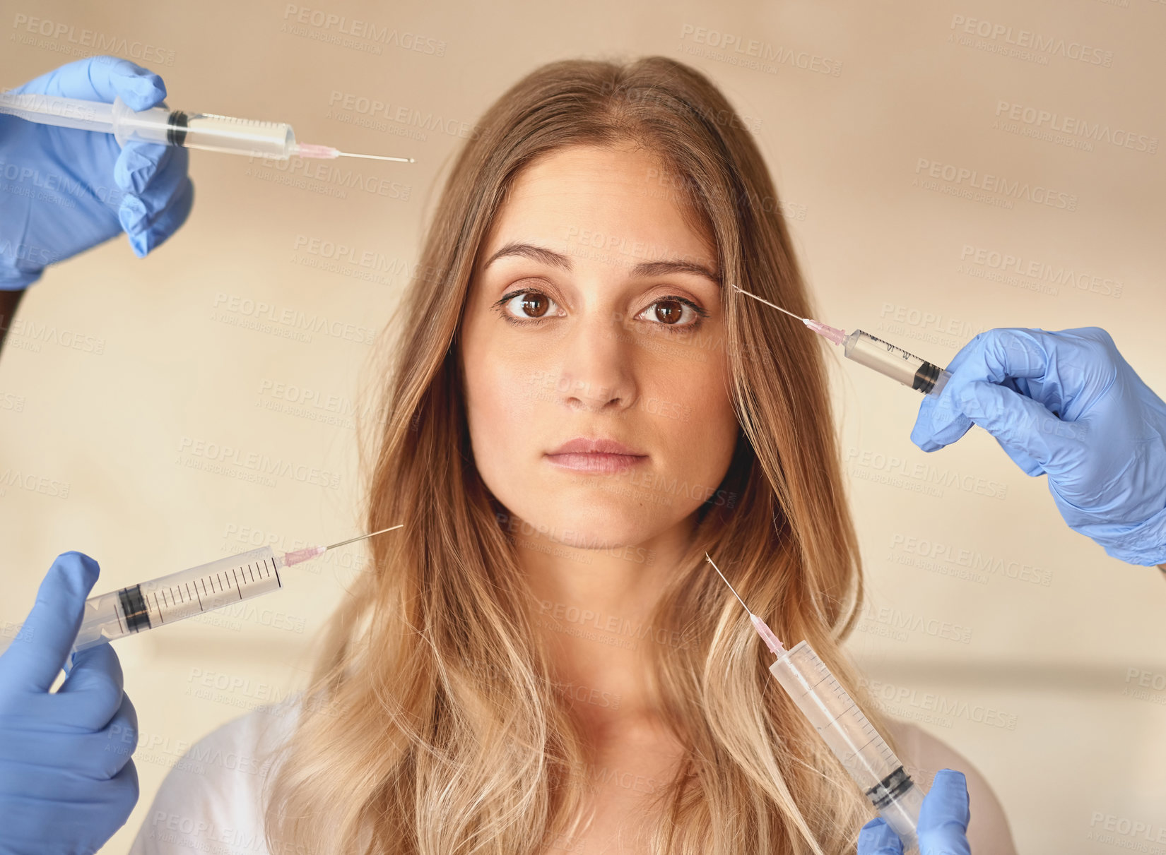 Buy stock photo Portrait of a young woman with needles pointed around at her face