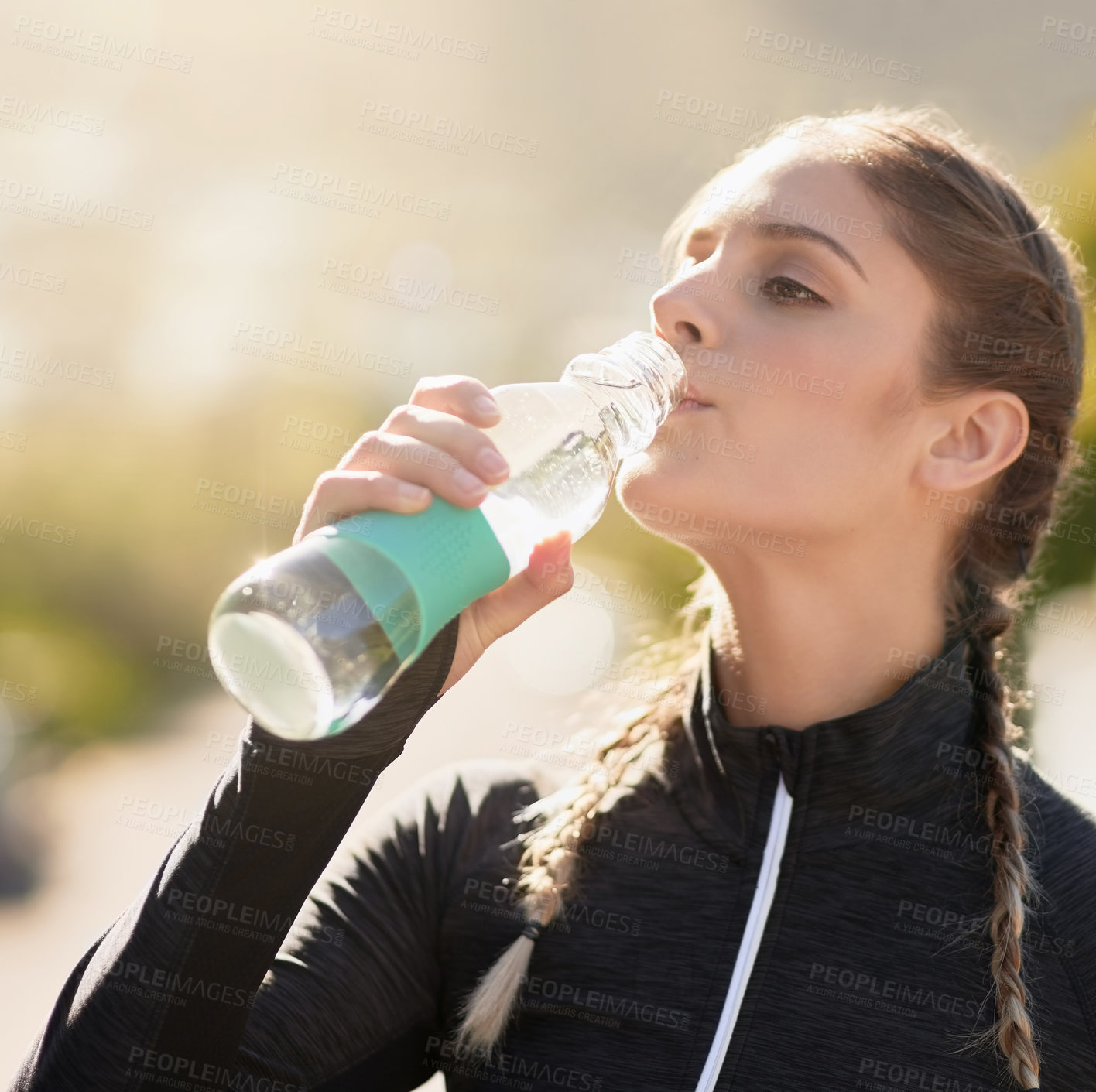 Buy stock photo Fitness, training and woman with drinking water in nature for workout, hydration and refresh. Runner, athlete and female person with bottle in park for cardio, healthy body and thirst in exercise