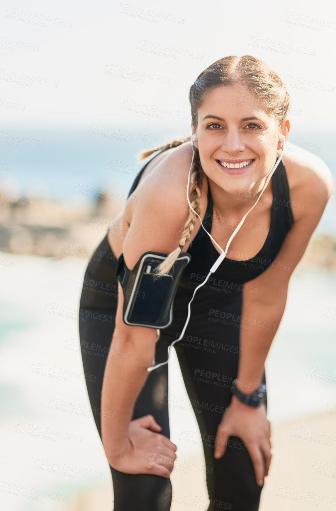 Buy stock photo Portrait of an attractive young woman smiling after her morning run