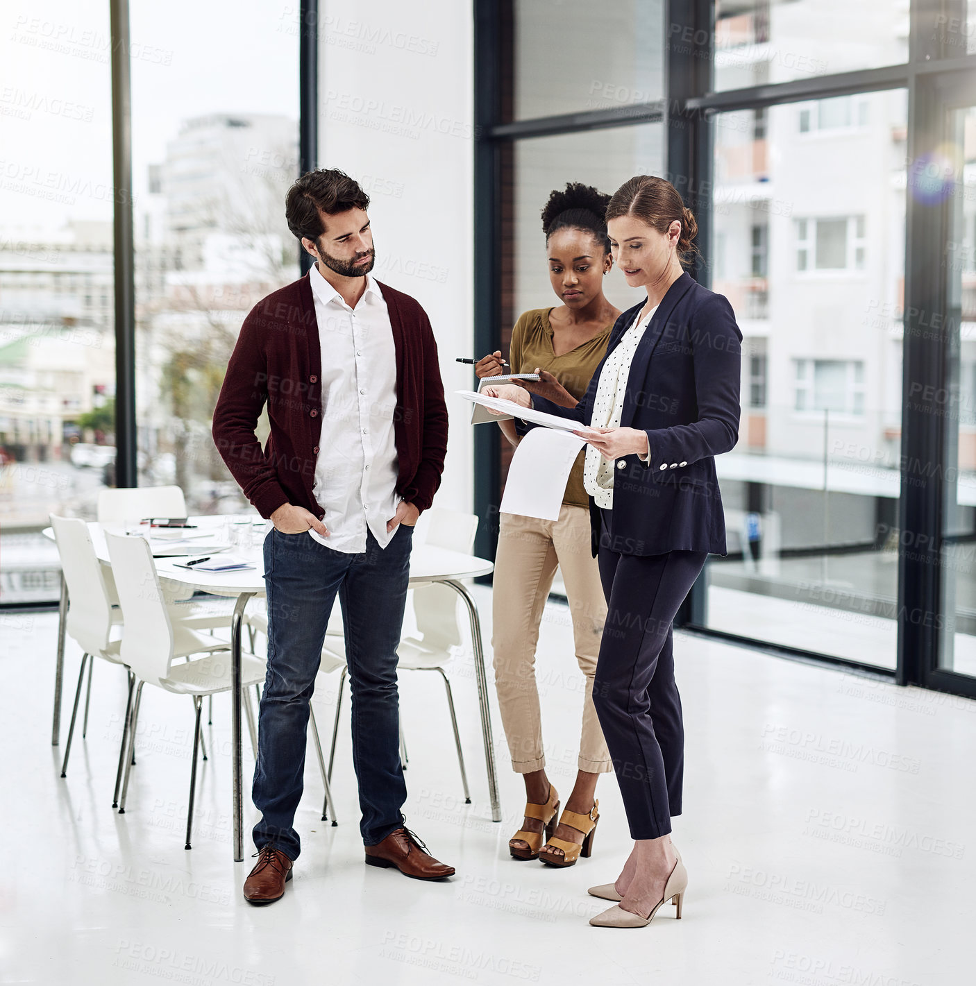 Buy stock photo Employee, people and serious at office with tablet for teamwork or collaboration and project. Ideas, discussion and sharing information on internet or online for company growth as graphic designer