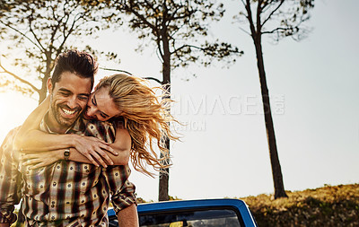 Buy stock photo Shot of an affectionate couple spending the day outdoors