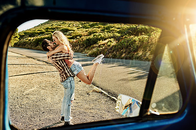 Buy stock photo Shot of an affectionate couple spending the day outdoors