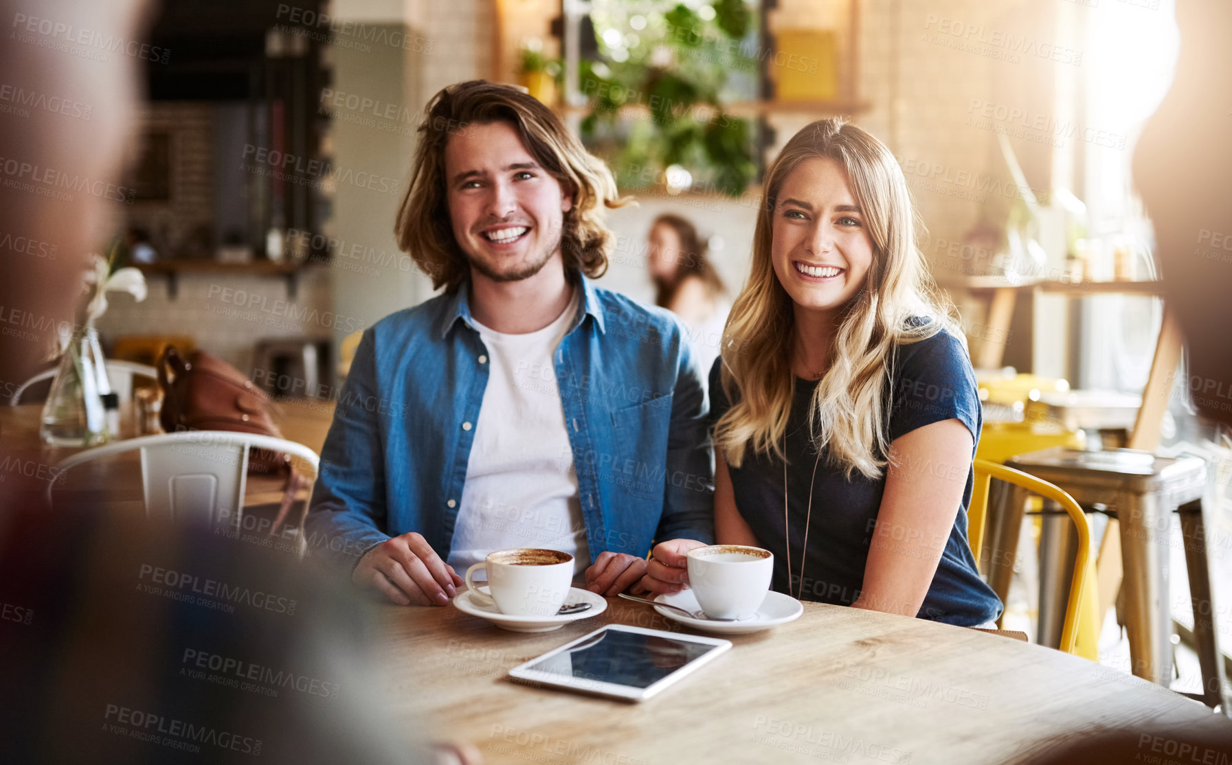 Buy stock photo Cafe, couple and discussion with smile for tea, beverage or bonding for relationship. Coffee shop, woman and man with conversation for dating, commitment or happy people for anniversary with espresso