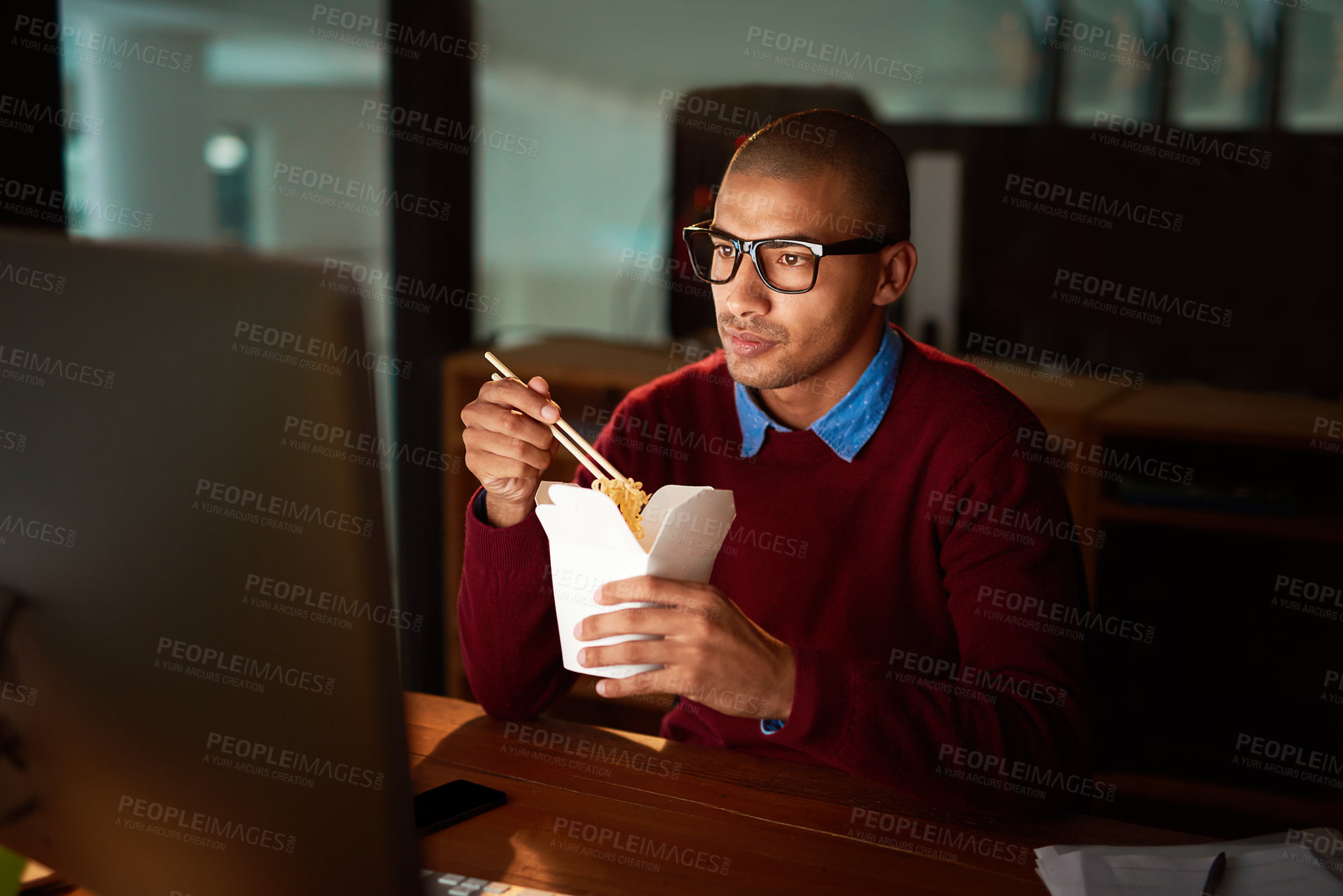Buy stock photo Late, night and businessman with Chinese food, computer and research for online project at startup. Reading, internet and consultant eating noodles at desk, checking email or report in dark office