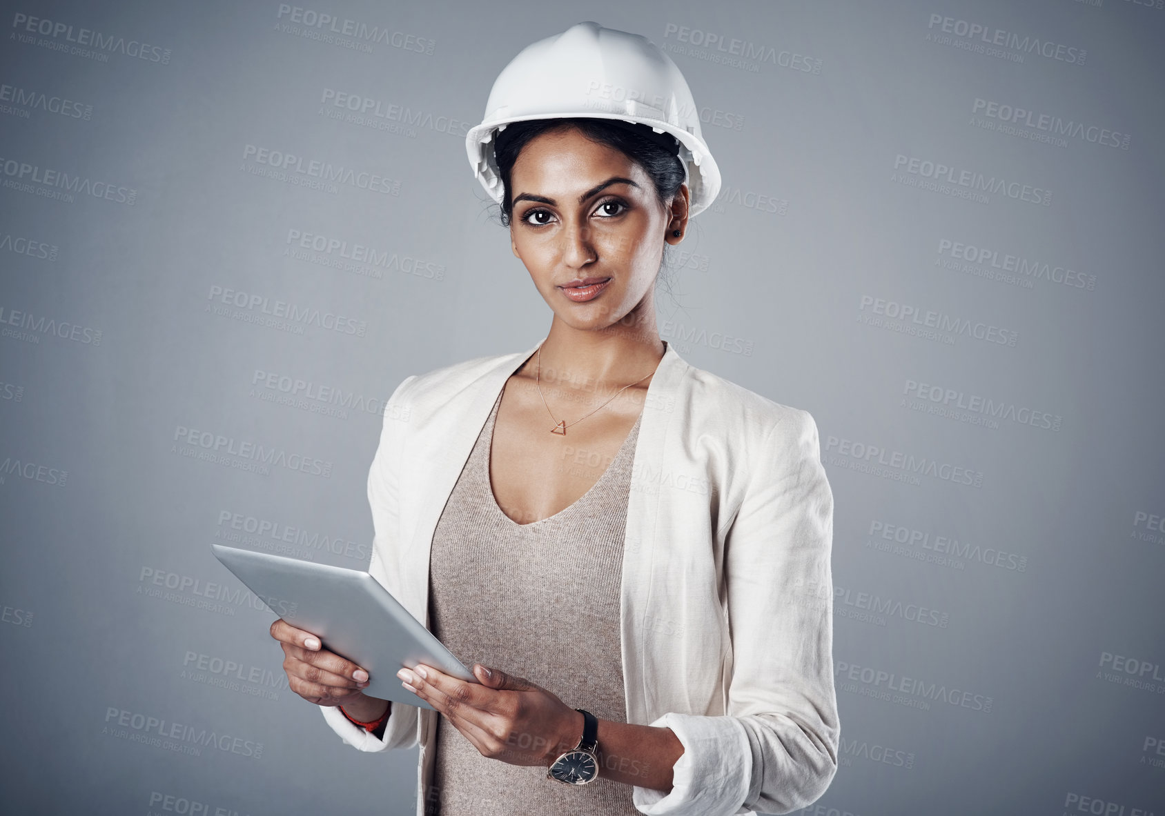 Buy stock photo Architect, portrait and tablet in studio for communication, construction and renovation progress update. Engineering, tech and woman on gray background for project, research and architecture report