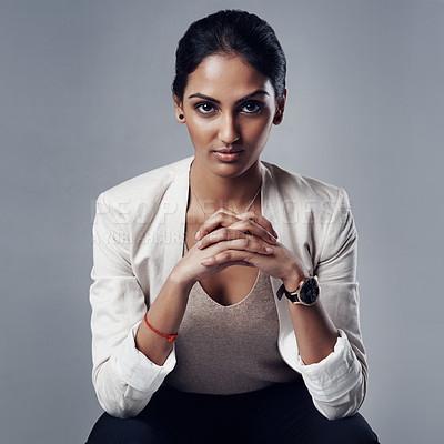 Buy stock photo Confident, portrait of a businesswoman and against a studio background for success. Elegance or assertive, empowerment or proud and female person pose for positive mindset against a backdrop