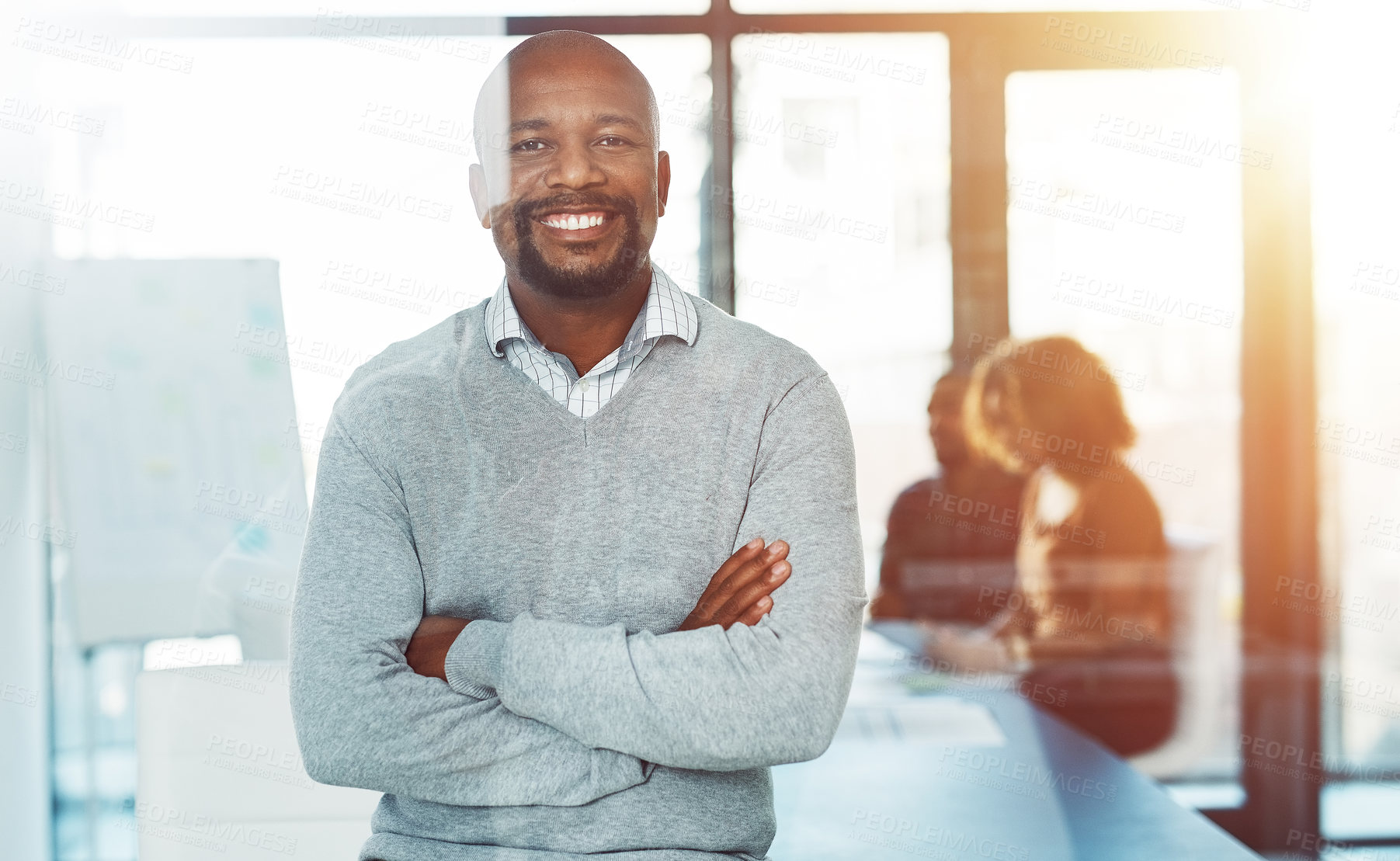 Buy stock photo Portrait, arms crossed and man in office, happy and smile in meeting, journalism and editor in business. Leader, person and writer in newsroom, confident and proud of story for media agency and press