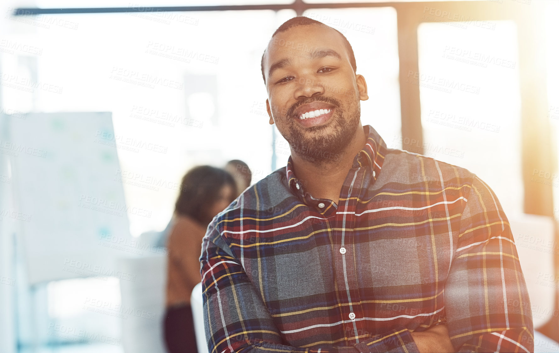 Buy stock photo Shot of a businessman posing in a boardroom