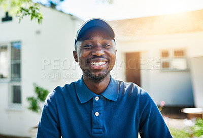 Buy stock photo Portrait of a young delivery man making a delivery