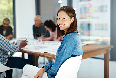 Buy stock photo Portrait of an attractive young woman sitting in the boardroom during a meeting