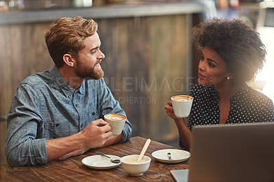 Buy stock photo Cropped shot of a young couple on a coffee date