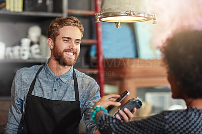 Buy stock photo Man, barista and client with smartphone payment, cafe and transaction for services, smile and fintech. Female customer, male employee and happy guy at a coffee shop, small business and financial