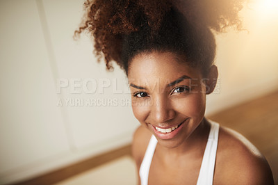 Buy stock photo Cropped shot of a young woman at home