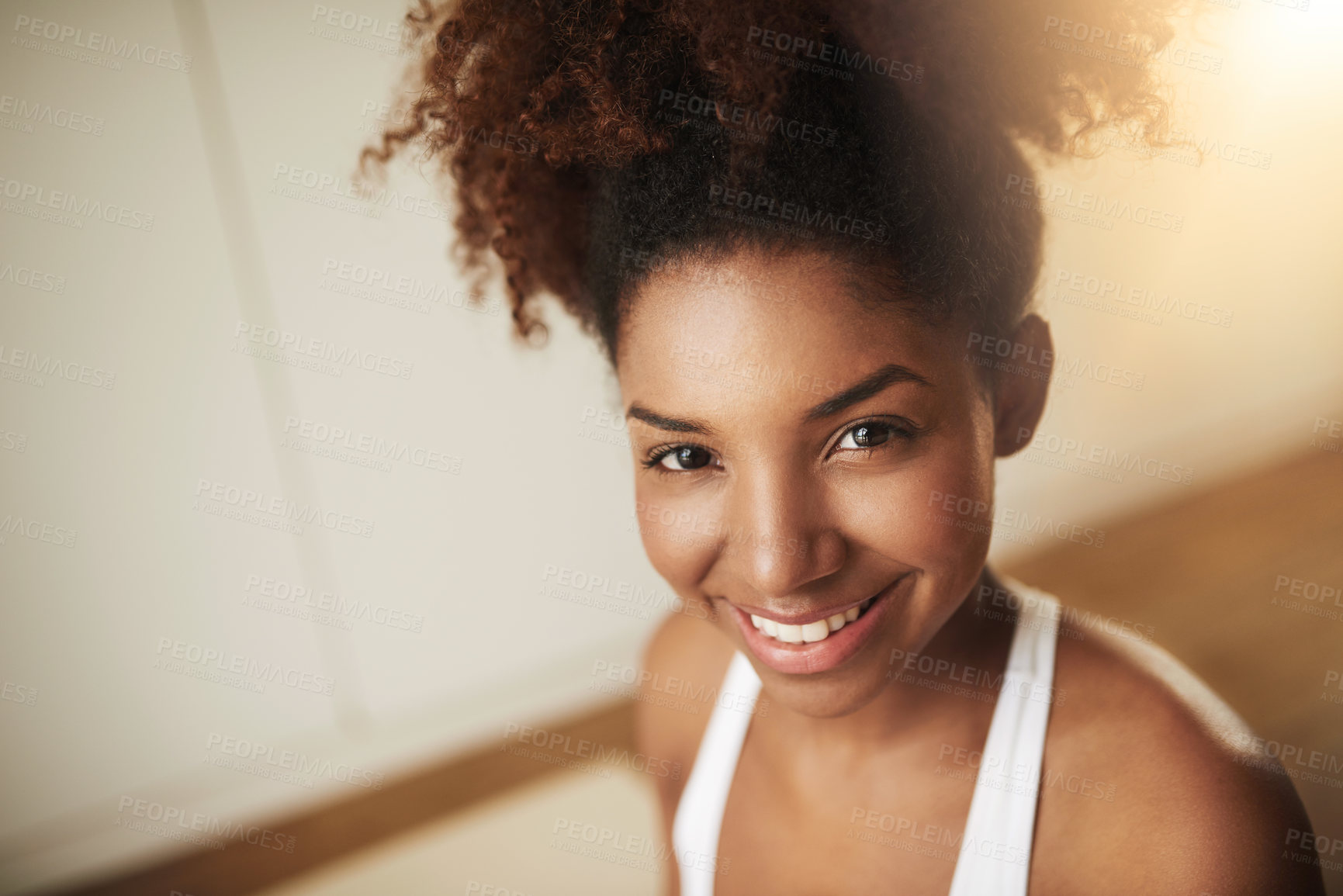 Buy stock photo Cropped shot of a young woman at home