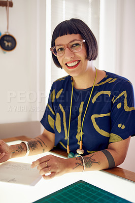 Buy stock photo Portrait of a stylish young designer at working on a light table in her studio